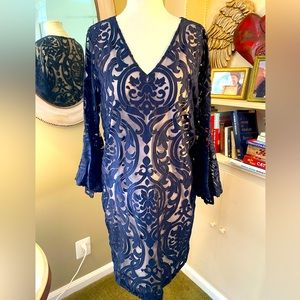 Lace blue over nude dress. 16. Bell sleeves. Zip up. Slight stretch. Gorgeous!